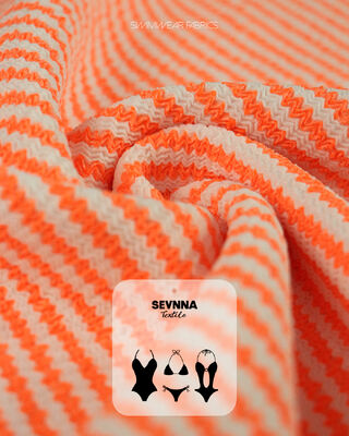 Wysokiej jakości teksturowana tkanina kąpielowa z 95% poliestru z recyklingu + 5% spandeksu, waga 280 gm i duża przepustność do kostiumów kąpielowych