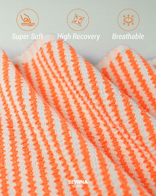 Wysokiej jakości teksturowana tkanina kąpielowa z 95% poliestru z recyklingu + 5% spandeksu, waga 280 gm i duża przepustność do kostiumów kąpielowych