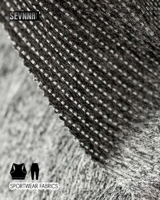 Miękki, rozciągliwy materiał na legginsy o wysokiej elastyczności i właściwościach odprowadzających wilgoć, idealny do odzieży sportowej i codziennej